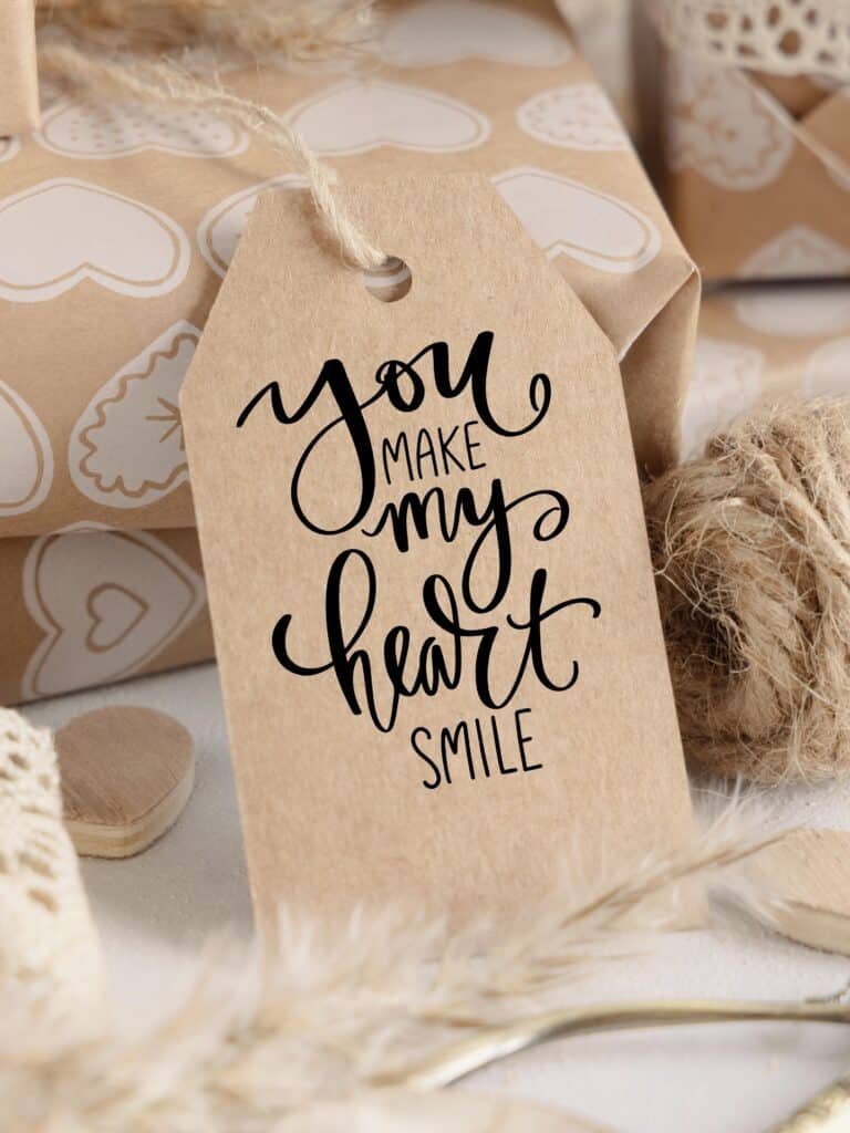What makes a gift meaningful showcased by gifts and a gift tag that reads you make my heart smile